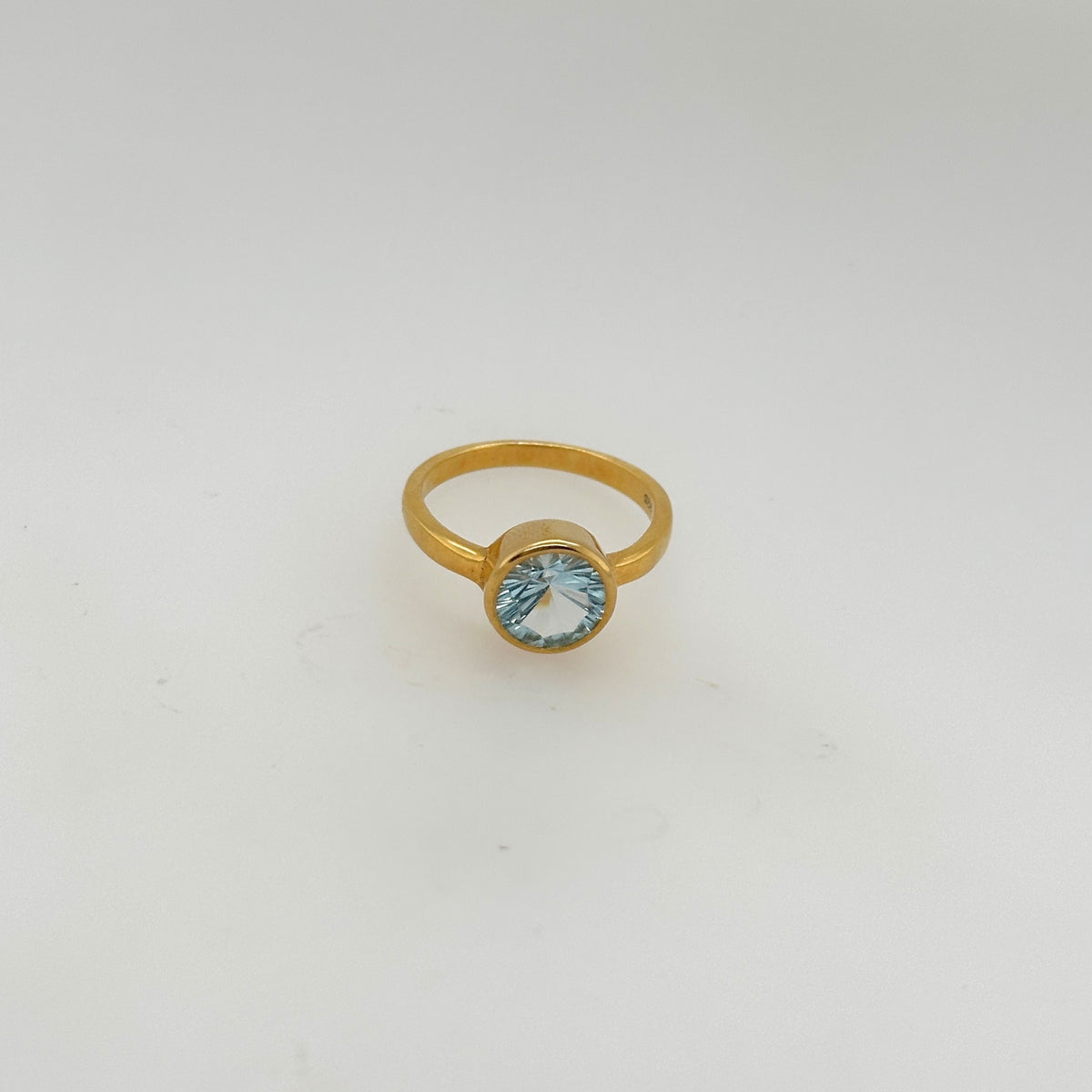 Bellatrix Blue Topaz Gold Plated Silver 925 Ring