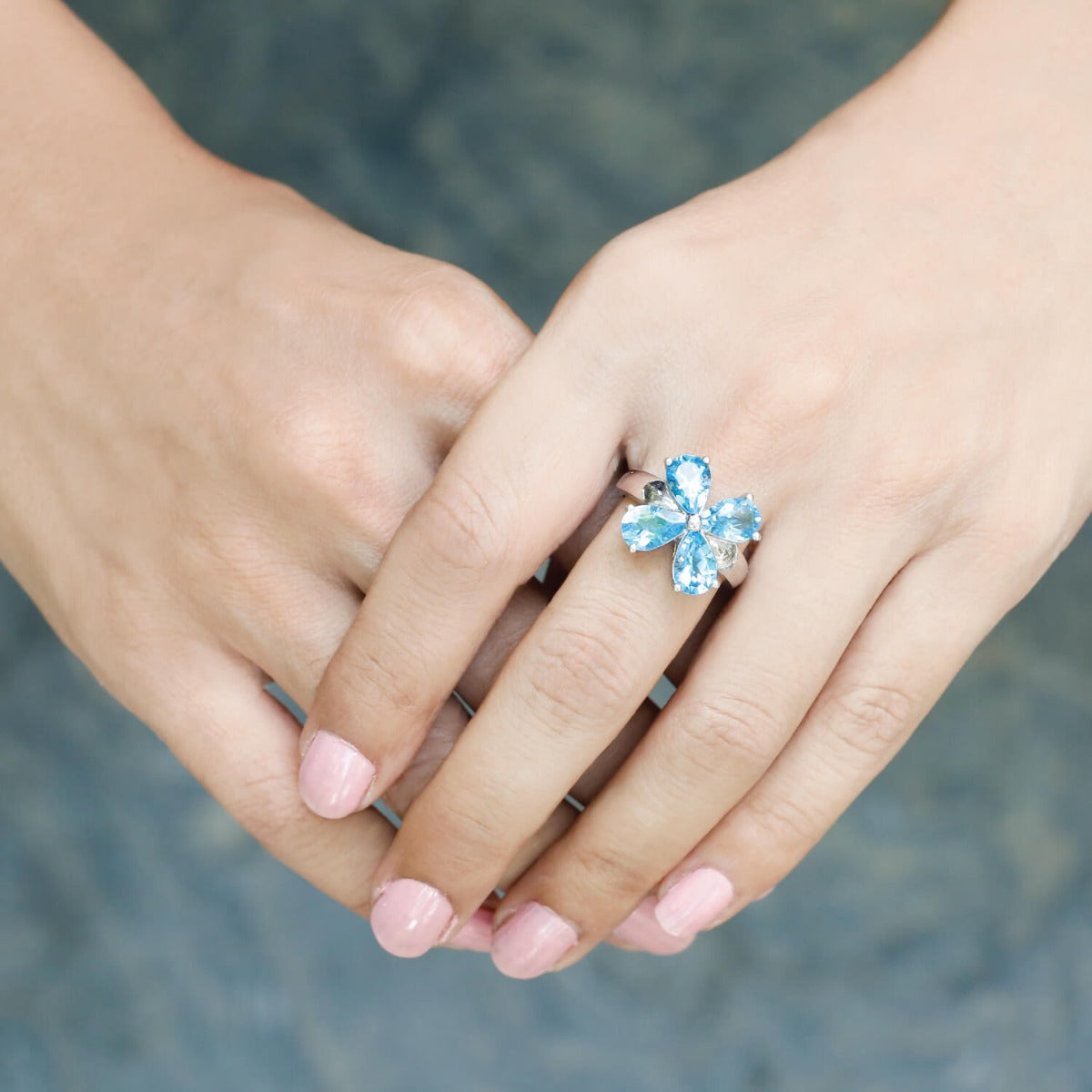 Stellar flower shaped blue topaz silver ring - Main Image