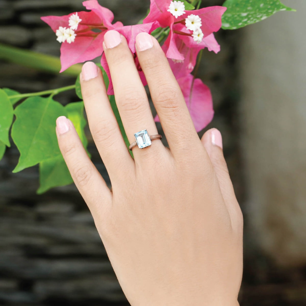 Winsome blue topaz silver ring