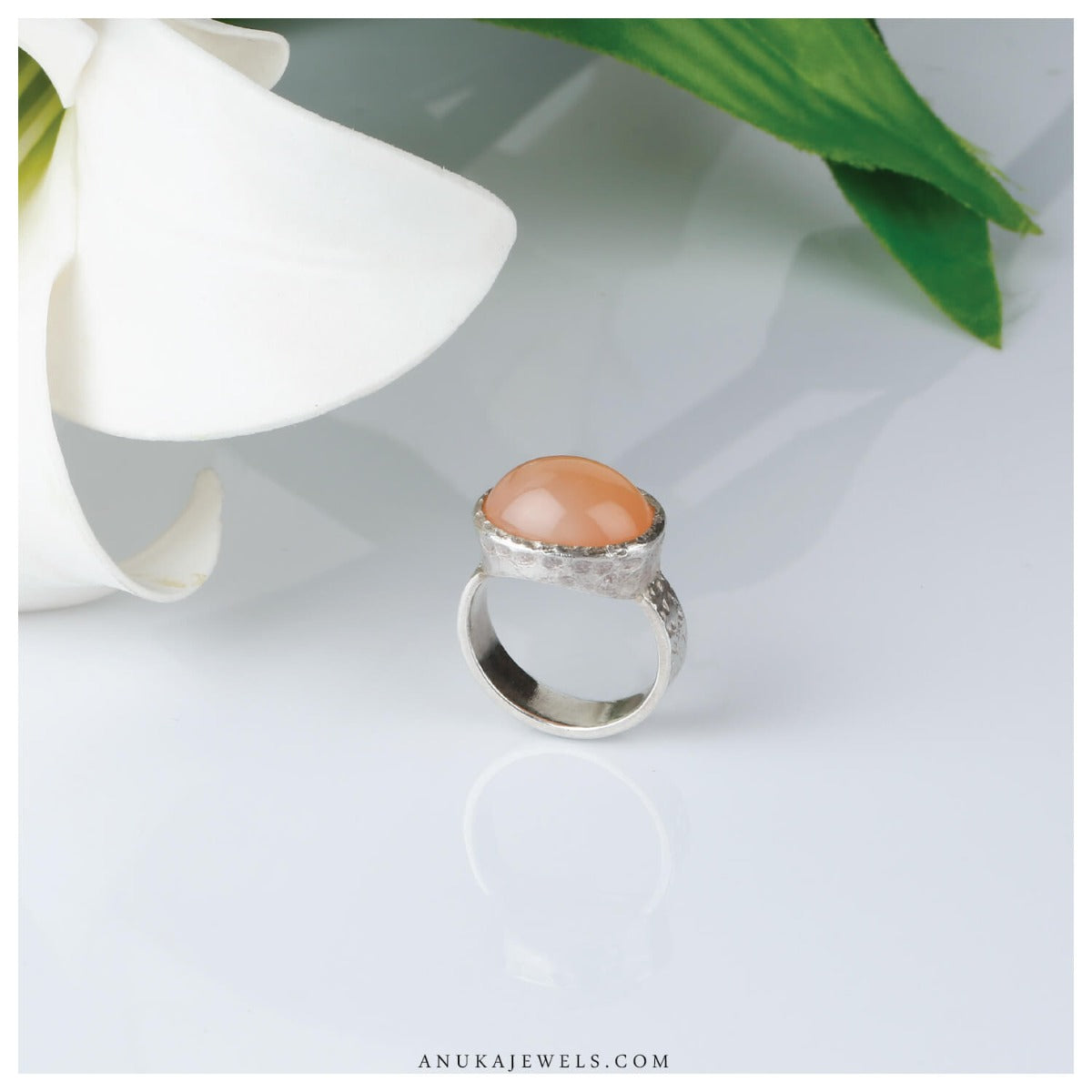 green silver ring