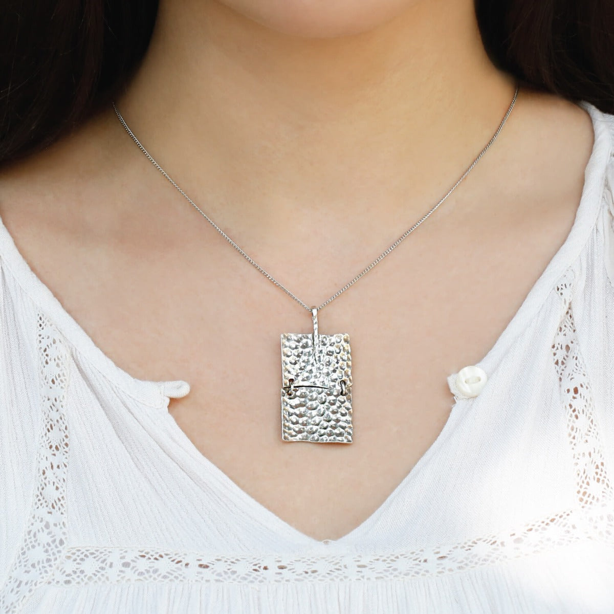 Modern silver best sale pendants