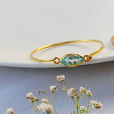 Ari Blue Topaz Gold Plated Silver 925 Bangle