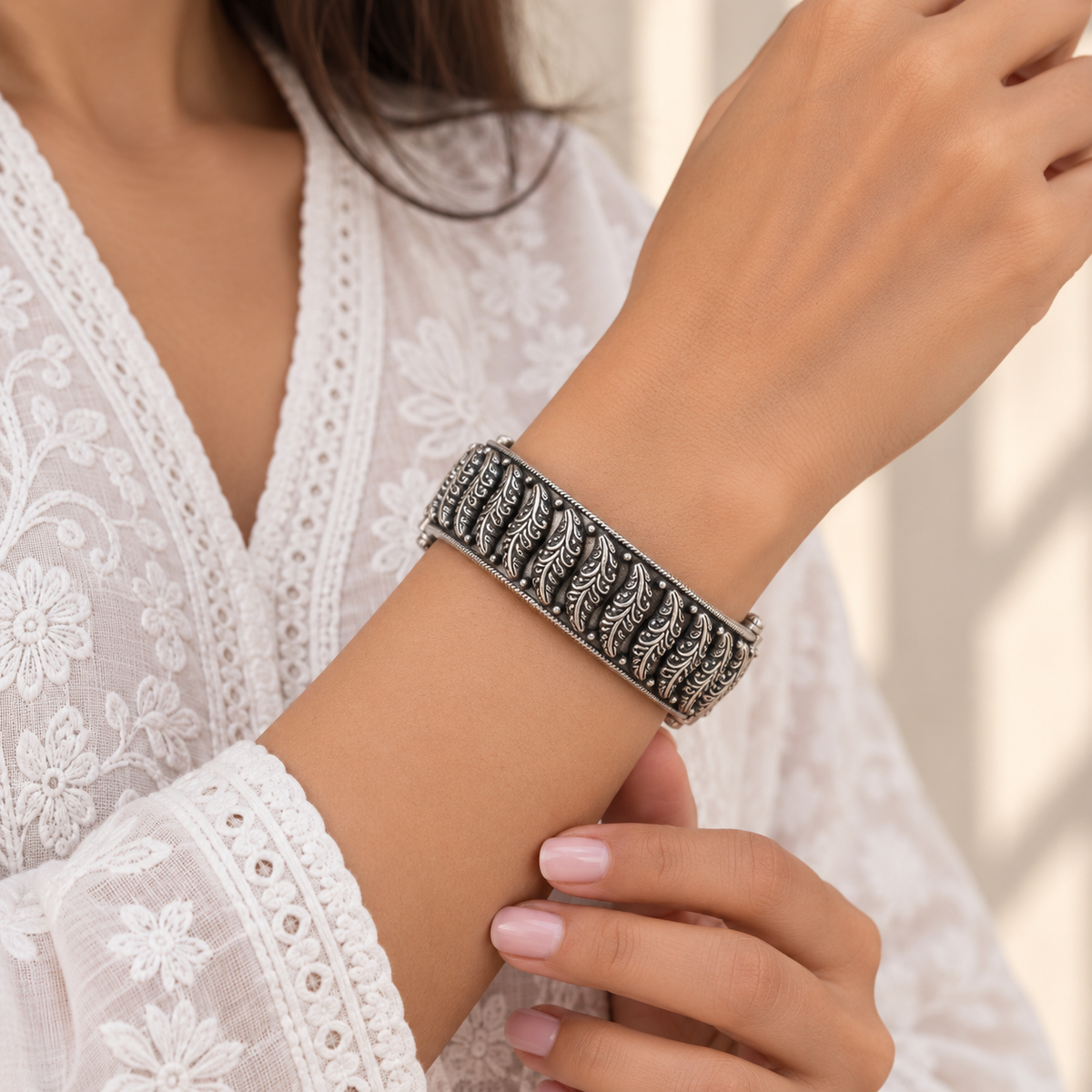 Artistic sterling silver bangle