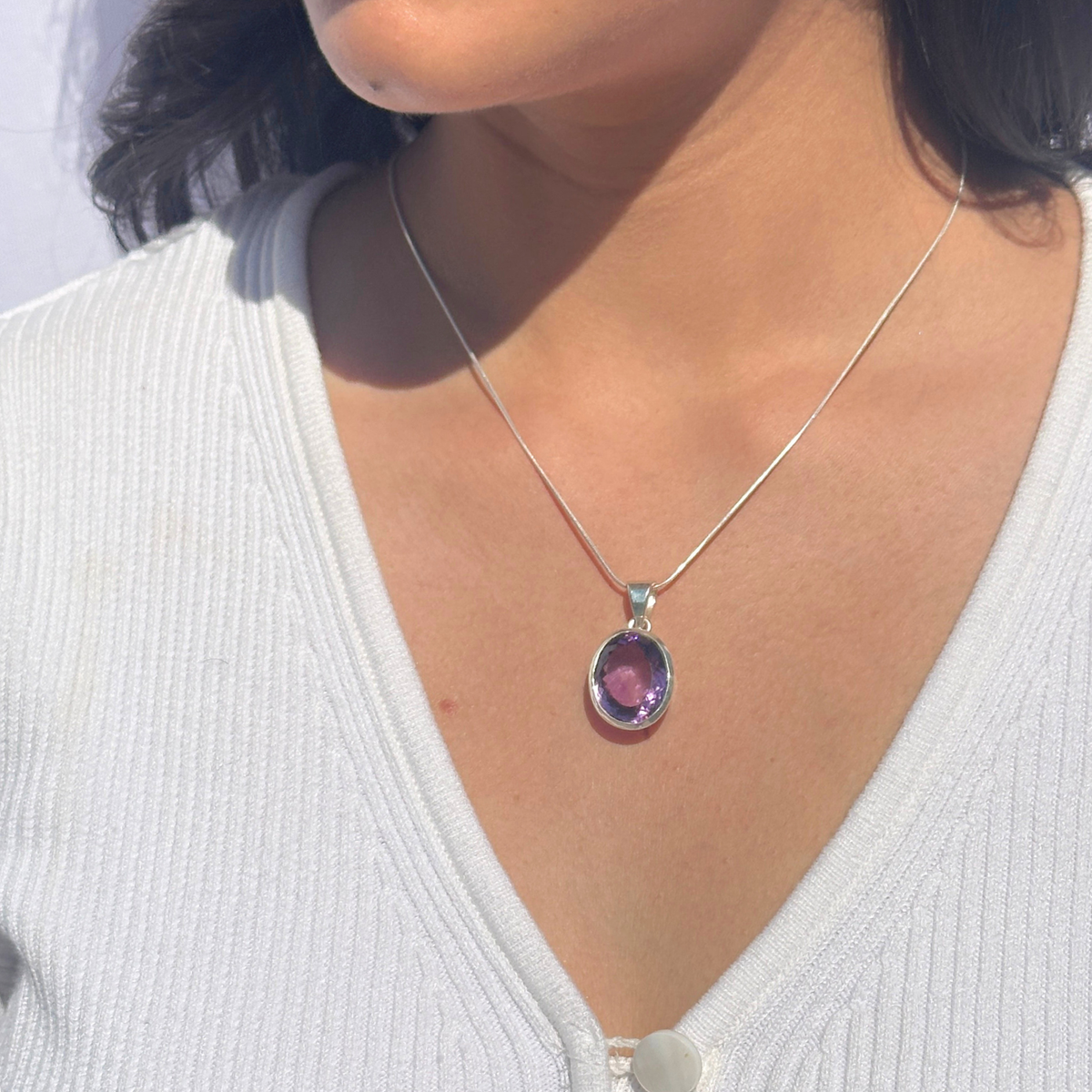 Amethyst silver 925 pendant for women

Natural amethyst gemstone silver pendant

Purple amethyst 925 sterling silver pendant

Minimal Pendant 

minimal amethyst Silver 925 pendant 

Pendant 

Silver Pendant 

Amethyst stone silver pendant

Person wearing a necklace with a purple pendant against a white background