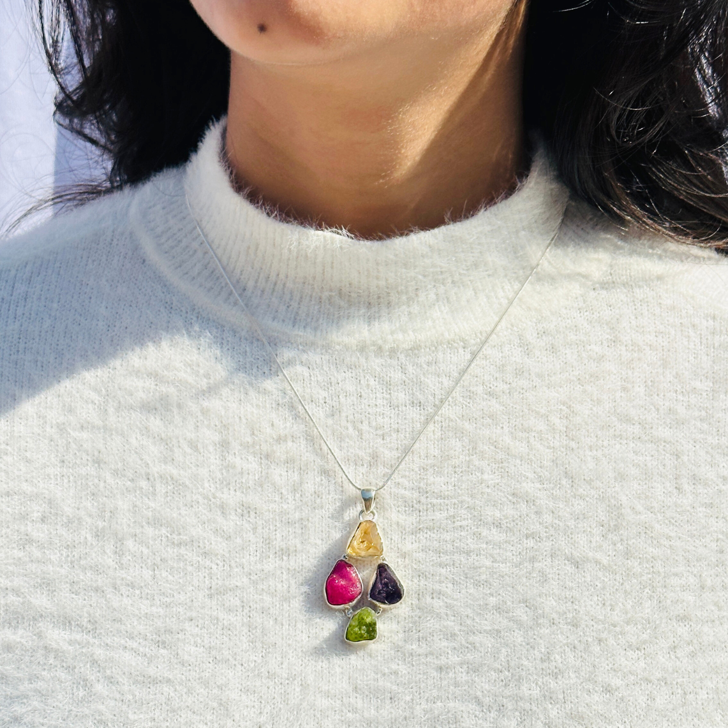 Minimal Pendants
Colorful Pendants
Gemstone Pendant
Peridot Pendant
Citrine Pendant
Amethyst Pendant
Minimal silver pendant
Green pendant
Blue pendant
yellow pendant
Multicolor pendant
Pendant for women
Gifts for women
Silver pendant 925

Collection of colorful gemstone pendants on a white surface


Necklace with colorful pendant worn by a person on a light gray sweater