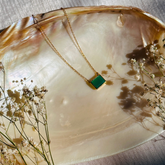 Green onyx silver 925 pendant necklace

Natural green onyx gemstone silver necklace

Green onyx 925 sterling silver pendant

Green onyx stone silver necklace India

Elegant green onyx silver necklace online

Minimal green pendant 

minimal pendant 

minimal jewelry 



Gold necklace with a green pendant on a large shell with dried flowers.