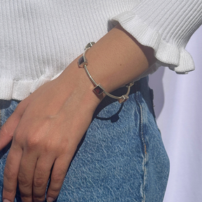 Natural garnet gemstone set in 18k gold plated 925 silver bangle

 Handmade garnet gold plated silver 925 bangle for women