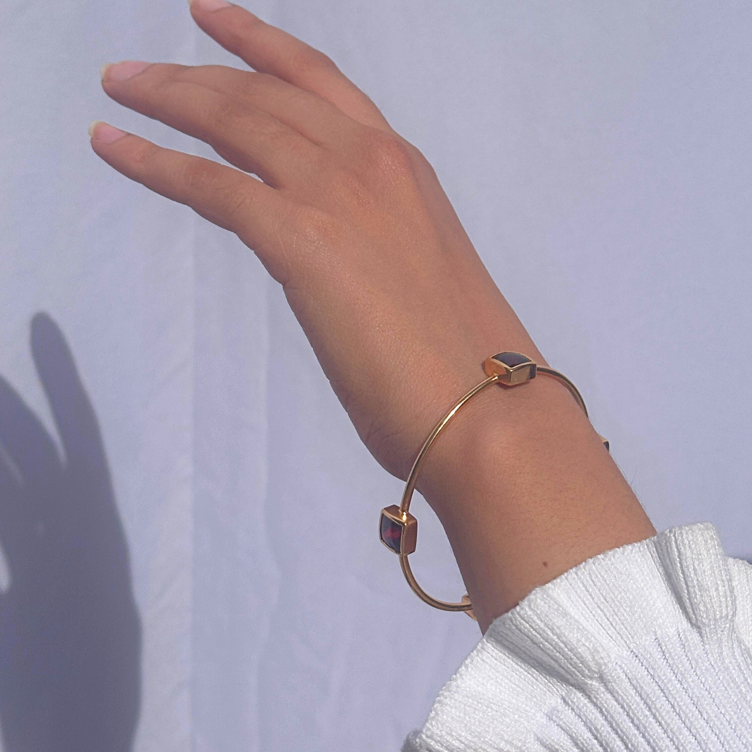 Natural garnet gemstone set in 18k gold plated 925 silver bangle

 Handmade garnet gold plated silver 925 bangle for women