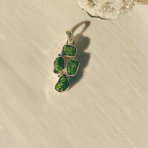 Minimal Pendants
Colorful Pendants
Gemstone Pendant
Peridot Pendant
Minimal silver pendant
Green pendant
Pendant for women
Gifts for women
Silver pendant 925

Collection of colorful gemstone pendants on a white surface