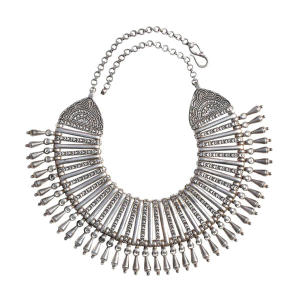 Silver fringe necklace on a white background