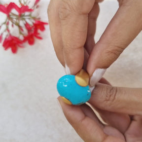 Beauteous oval shaped turquoise gold plated silver ring