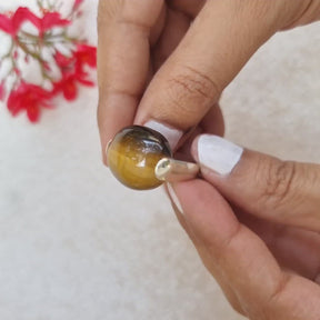 Statuesque round tiger eye sterling silver ring