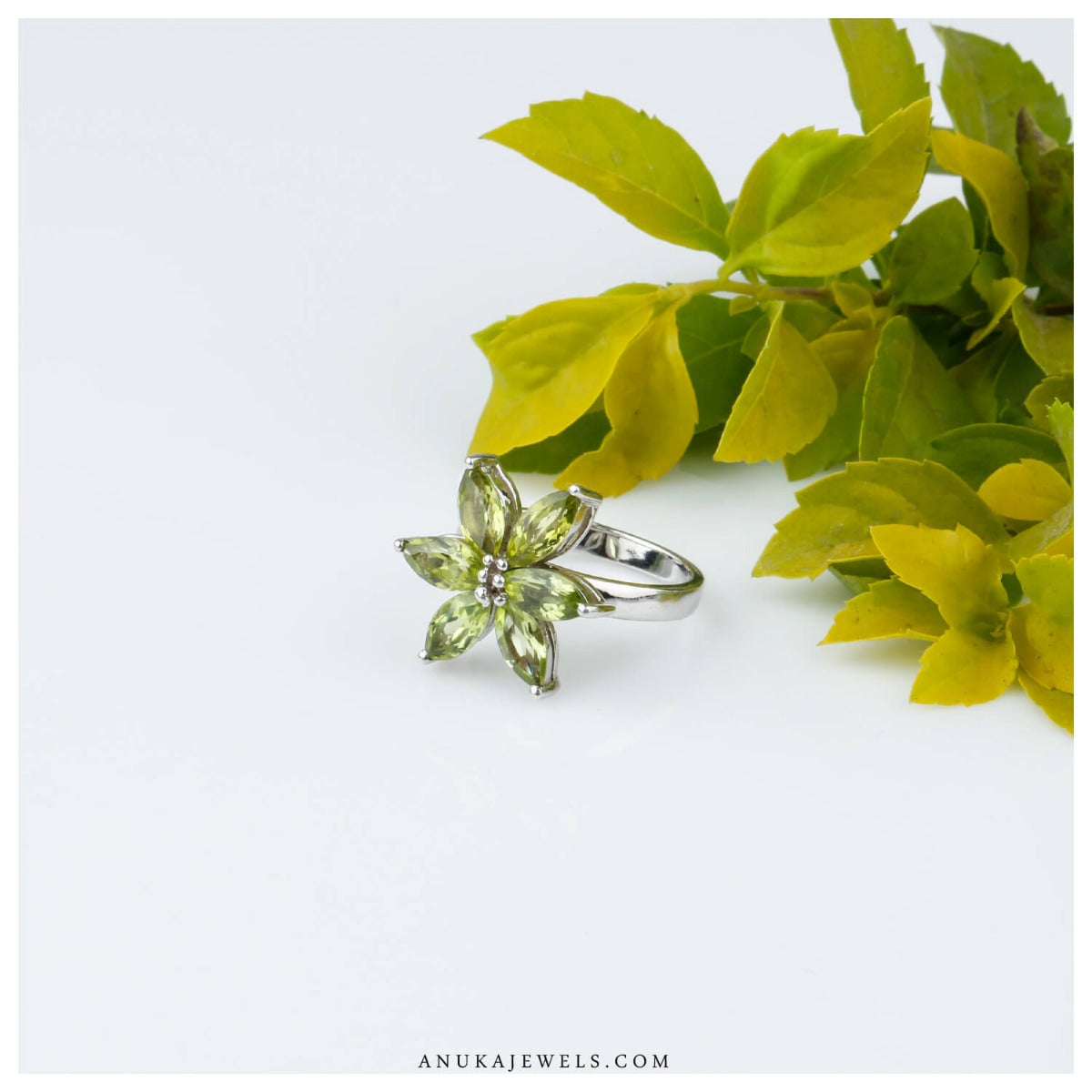 Hana silver peridot flower ring bold floral face