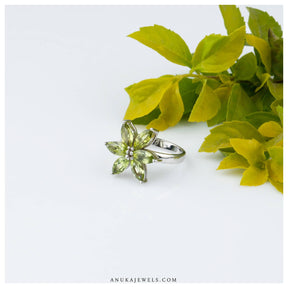 Hana silver peridot flower ring bold floral face