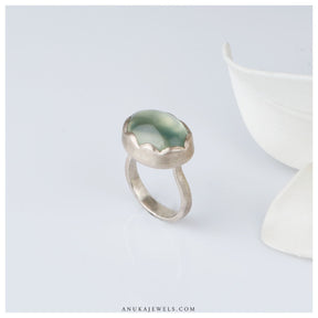  green silver ring