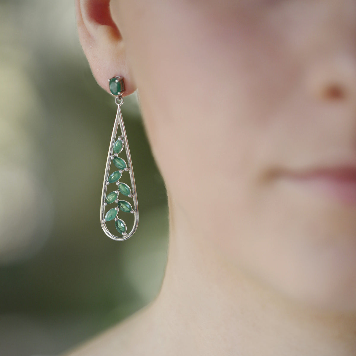 Silver Earrings with Marquise cut Emerald