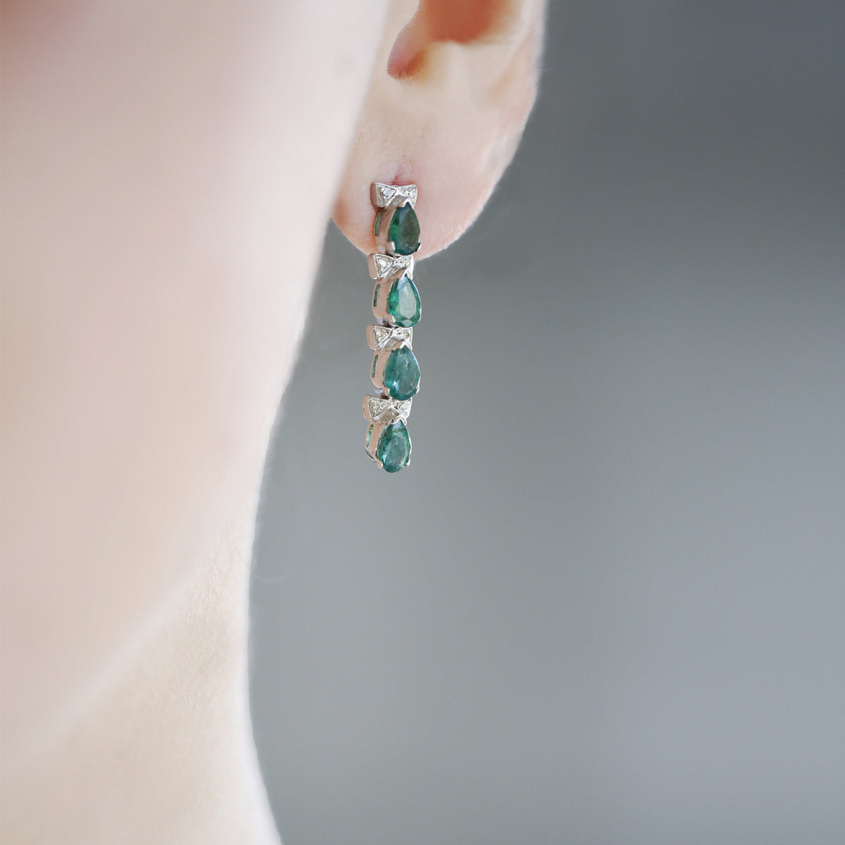 Silver Earrings with Emerald and Diamond Bow