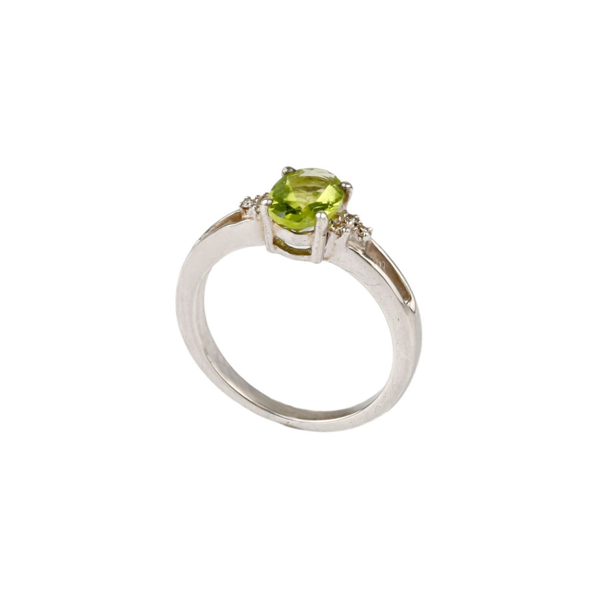 peridot and diamond ring close up claw setting detail