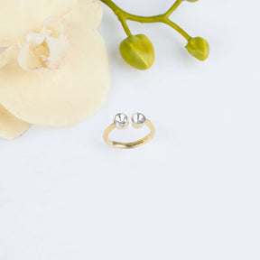 Two faced gold plated diamond ring