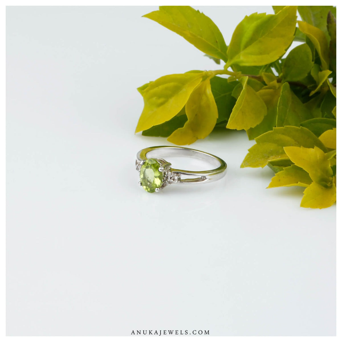 silver peridot ring for women split band side view